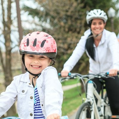 A Family having fun on bikes on spring season